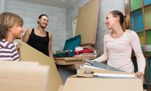 Removal van with recyclable household items ready for sorting