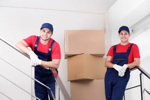 Piano movers navigating a tight Brookgreen property entrance