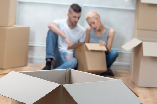 Trained movers handling furniture with care in Brookgreen