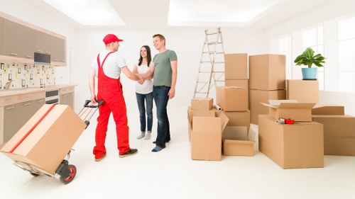 Brookgreen moving team handling boxes and furniture carefully