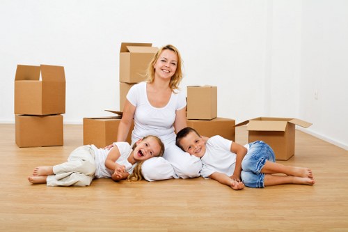 Local removal team preparing boxes and furniture for transport