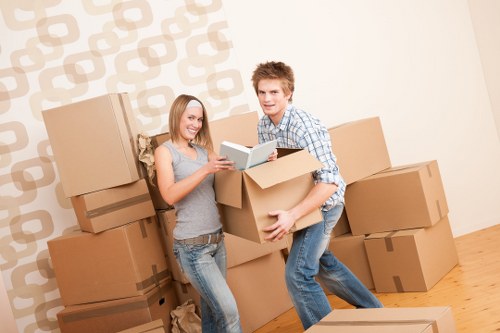 Careful loading of furniture and boxes into a moving van