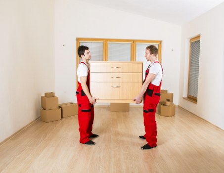 Brookgreen moving team loading furniture into a removal vehicle